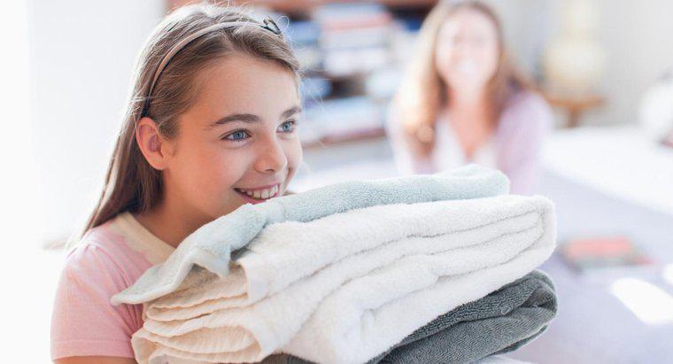Em que configuração de temperatura você deve lavar suas toalhas?