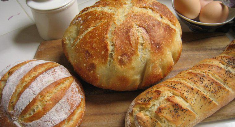 Quais são as diferenças entre os pães Miche e Baguette?