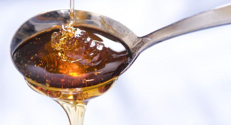 Quantas gramas de açúcar tem uma colher de chá de mel?