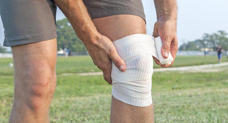 Quais são os sintomas de uma ruptura do ligamento do joelho?