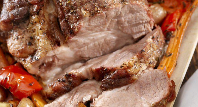 Por quantos minutos por libra se deve cozinhar o lombo de porco?