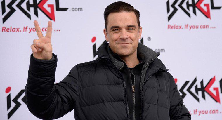O que significam as tatuagens de Robbie Williams?